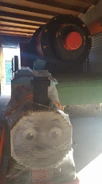 The prop with a Mega Bloks Thomas statue in storage