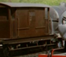 A dark brown brake van