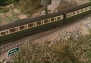 Two green Express coaches in Magical Adventure