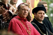 Wolsey watches a tournament with Sir Thomas More