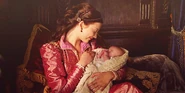 An infant Elizabeth; with her mother, Anne Boleyn.