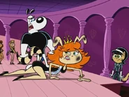 Dudley injures Miss Petropolis, thinking she's the Chameleon.