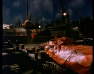 Unloading munitions.png (476 KB) Buoy being loaded aboard Kraka-Toa