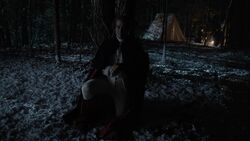 George Washington kneeling alone in the woods