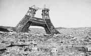 Another image of the damaged Eiffel Tower in the ruins of Paris in July 1944.