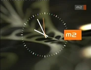 Часы M2 (2009-2012)