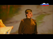 Скриншот эфира телеканала «Карусель» 12 июня 2015 года с праздничным логотипом ко Дню России в правом верхнем углу экрана