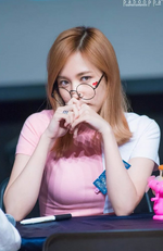 Mina wearing glasses