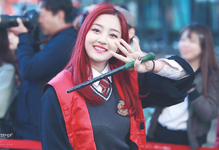 Jihyo holding a wand