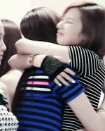 Mina and Sana hugging