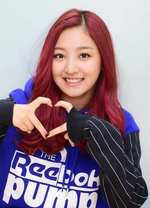 Jihyo making a heart sign