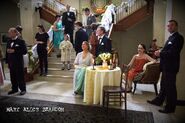 Wedding guests between takes (can you spot the person not supposed to be in the scene)