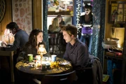 Bella and Edward eating dinner in an Italian Restaurant in Port Angeles.