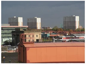 View north from Birmingham New Street railway line, across Millenium Point and Birmingham City University Campus towards Duddeston Manor Estate, Nechells Green, Aston.