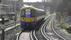 London_Overground_378222_5_Car_Train_Departing_Bushey-0