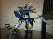 Zyrin with its "wings" as shoulder cannons and its BakuNanos, Scythokrar and Blastorix.