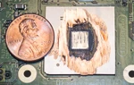 IBM PowerPC "Gekko" processor (180 nm) shaven down to show the silicon die.