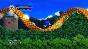 Sonic races around a corkscrew in the game's first level.