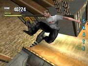 The player, as Tony Hawk, has gathered all the letters of the word "SKATE". The screenshot is taken from the Dreamcast version.