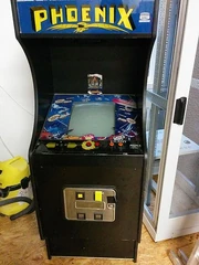 An officially-licensed Italian arcade cabinet of Phoenix, manufactured by Amtec in 1981
