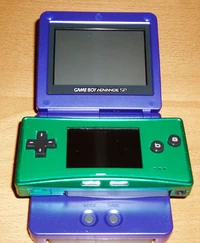 Comparing the size of Game Boy Micro and Game Boy Advance SP.