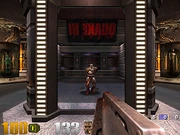 A mirror reflects Sarge and the Quake III logo in the opening scene of the first level, Q3DM0.