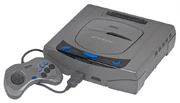 Japanese Sega Saturn, released in November 1994.  The 32X was incompatible with Saturn software.