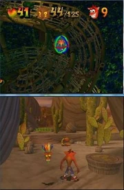 Top: In this level,  rolls along while inside an "Atlasphere". A menu at the top of the screen shows the number of Wumpa fruit collected, the current number of boxes broken (out of the level's box total), and the number of lives. Bottom: Another level. To Crash's left is , a sentient mask who protects Crash from damage. To Crash's right is a "?" platform, which leads him to a Bonus Round. Various hazards lie in front of Crash. An enemy scorpion patrols in front of the bridge, while an enemy bird hovers above a row of explosive Nitro crates on the far side of the bridge.