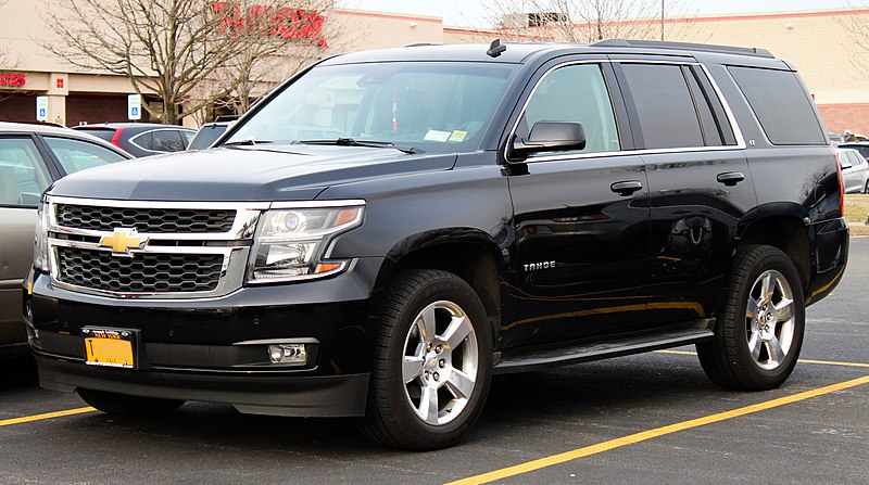 https://static.wikia.nocookie.net/ultimatepopculture/images/d/dc/2015_Chevrolet_Tahoe_LT_5.3L_front_02_3.24.19.jpg/revision/latest?cb=20191118150936