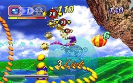 Nights flying through Elliot's first level, Splash Garden, in the Saturn version. From left to right, the interface displays the number of orbs required to proceed, time limit, and score.