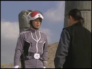 Dan confronting Captain Shiragane before the latter being knocked unconscious by the former