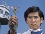 Kotaro holds the Ultra Badge for the last time