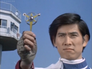 Kotaro holds the Ultra Badge