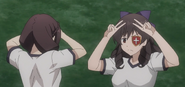 Arue teaching the Ultraseven pose to Yunyun