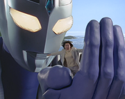 Fujimiya/Agul takes Reiko flying over the sea.