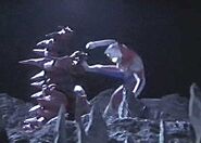 Mons-Ahgar battling Ultraman Dyna (Flash Type)