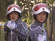 Mizuno and Shima reacted while trying to arrest Kazamori for being an alien