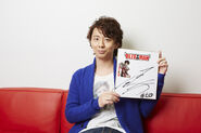 Ryohei Kimura with his signature besides a photo of Shinjiro Hayata.