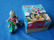 A strange figure of Ultraman Riding a trycicle