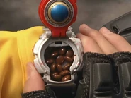 Imagekakwkwks,ski.jpg (226 KB) Ginga prepares to eat the candies.