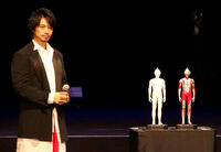 Kairi, Tohl Narita's son alongside the concept figurines of Ultraman.