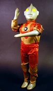 20 inches tall, Marusan 1966 Talking Ultraman ( non talking version ). Released in a talking and non talking version, Features hard plastic body, ultraman suit made of silk like material, semi posable arms, and thin soft vinyl boots.