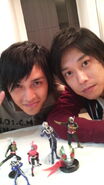 Hassei Takano and Takeshi Yoshioka with Ultraman and Kamen Rider action figures