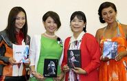 Yukari Taki (Arisa Sugita), Yuriko Hishimi (Anne Yuri), Hiroko (Akiko Fuji) and Takami Yoshimoto (Rena Yanase) representing the Ultraman Ginga, Ultraseven, Ultraman and Ultraman Tiga DVD/Blu-rays