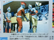 Redman serving as a pallbearer with Triple Fighter, Mirrorman, Fireman and Jumborg Ace at a 'funeral' for retired monster suits.