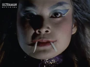 BatGirlFangs.jpg (115 KB) Fangs