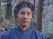 Tsunoda as Dr. Yamano/Alien Kyulia in Ultraman Cosmos