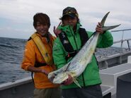 Takeshi & Taiyo with a fish