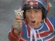 Kotaro uses Ultra Badge