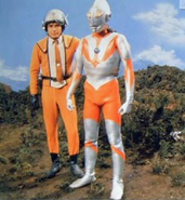 Susumu Kurobe, uniformed as Shin Hayata, with Bin "Satoshi" Furuya suited up in his "Ultra Armor."